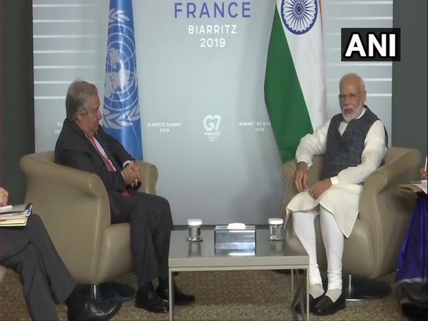 Prime Minister Narendra Modi and UN Secy General Antonio Guterres during their meeting on the sidelines of G-7 summit. Photo/ANI