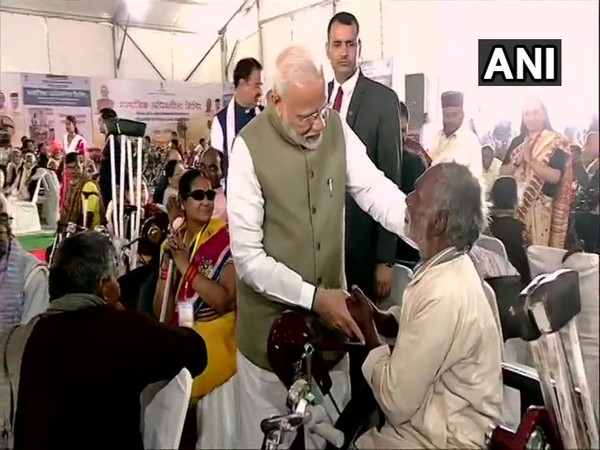 Prime Minister Narendra Modi at a distributive camp in Prayagraj on Saturday