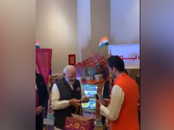 Prime Minister Narendra Modi making transaction using RuPay card in the UAE on Saturday.