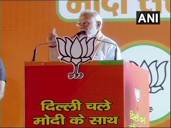Prime Minister Narendra Modi addressing a public rally in Delhi on Wednesday.