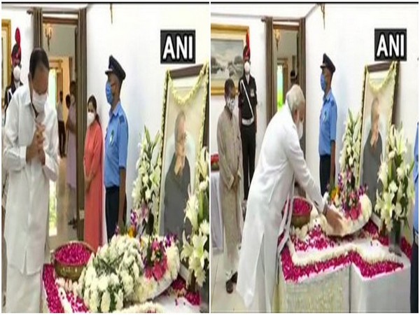 Vice President Venkaiah Naidu (L) and Prime Minister Narendra Modi (R) paid their tribute to former President Pranab Mukherjee at his residence, 10 Rajaji Marg. [Photo/ANI]