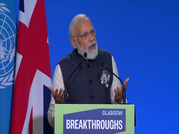 Prime Minister Narendra Modi speaking at a COP-26 event.