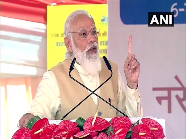 Prime Minister Narendra Modi addressing an event in Varanasi on Monday. (Photo/ANI)