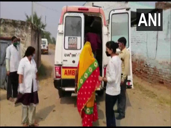 The mother of Hathras victim is being accompanied by two of her family members on her way to hospital. (Photo/ANI)