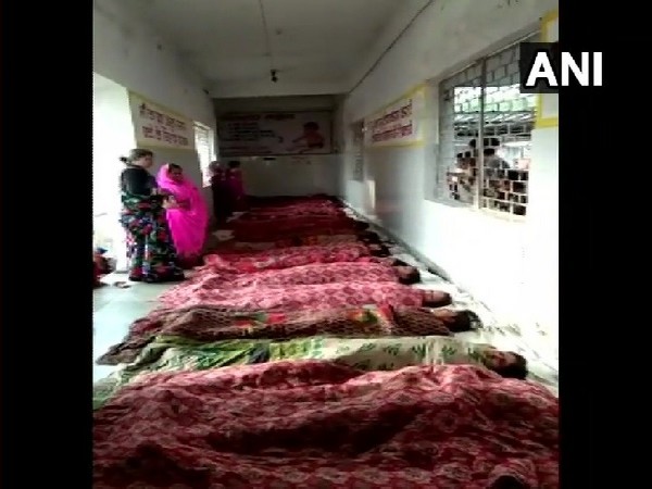 Women lying on the floor of Gyaraspur primary health centre in Vidisha, Madhya Pradesh.