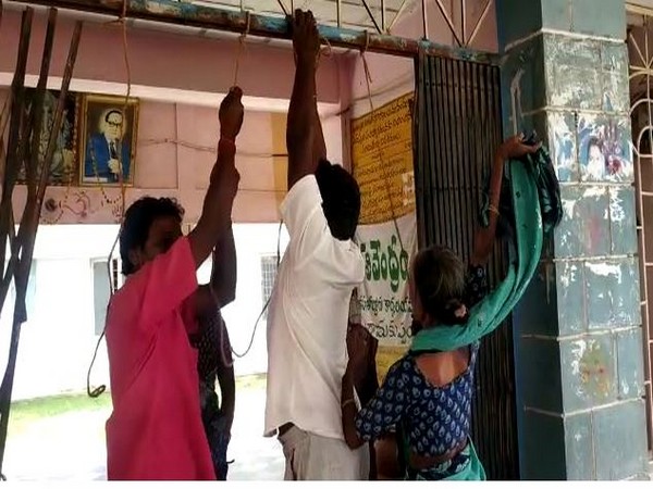 Visual of family members at Ramakuppam MRO office in Chittoor district.