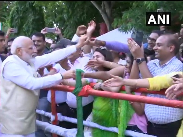 Prime Minister Narendra Modi greeting the Indian diaspora at India House in Colombo on Sunday (Photo/ANI)