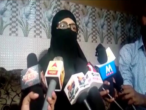 The woman, who was given triple talaq, talking to reporters on Friday. Photo/ANI