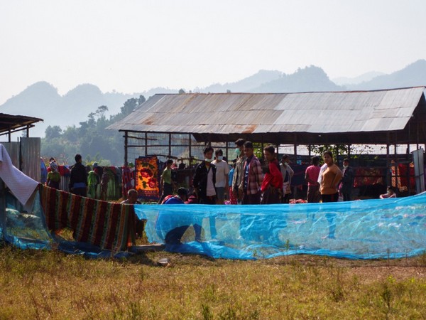 Refugees stand at a temporary shelter in Mae Sot district, Tak province, Thailand. (Pic credit: Reuters)