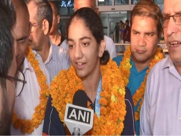 Nitu Ghangas at the Delhi Airport. (Photo- ANI)