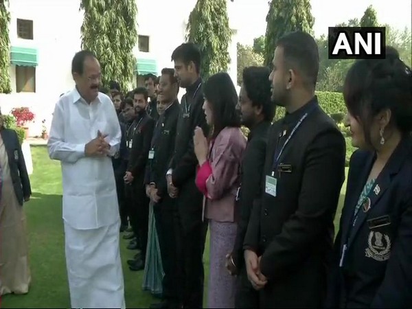 Vice President M Venkaiah Naidu with IRS officers on Tuesday in New Delhi. 