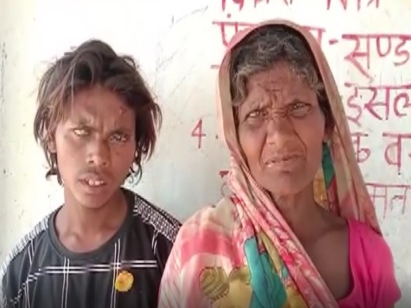 The minor boy with his mother in Nalanda. Photo/ANI
