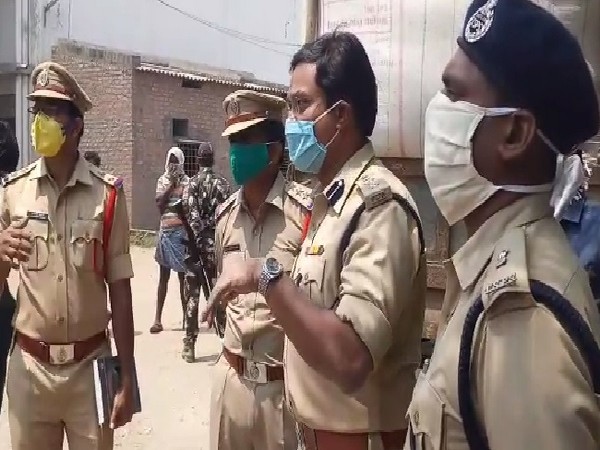 Nalgonda SP AV Ranganath interacting with farmers on Saturday. 