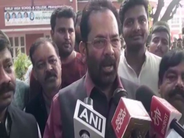 Union Minister Mukhtar Abbas Naqvi speaking to media persons in Prayagraj on Saturday. (Photo/ANI)