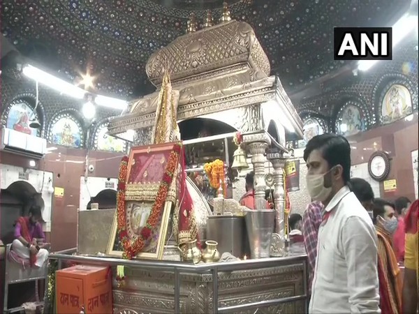 Devotees queue up outside Delhi's Kalka Ji Temple to offer their prayers on the first day of Navratri. (Photo/ANI)