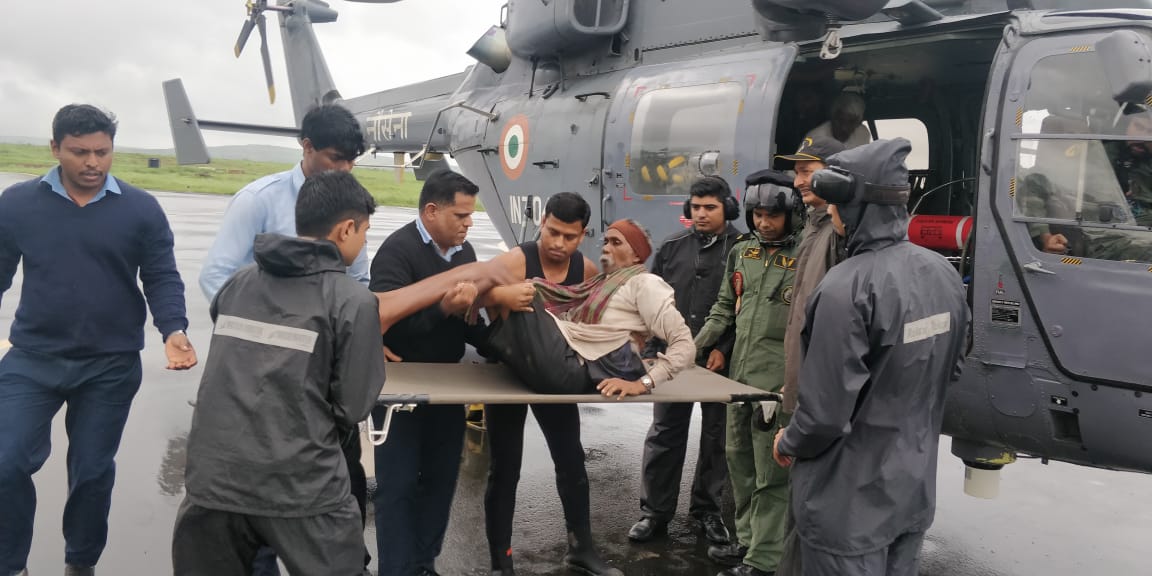 Visuals of Naval teams evacuating one of the flood victims on Saturday. Photo/ANI