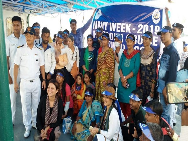 The children from TMC institute with officials of the Indian Navy. Photo/PIB