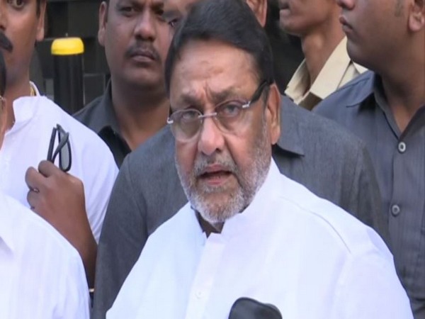 NCP leader Nawab Malik speaking to reporters in Mumbai on Tuesday. Photo/ANI