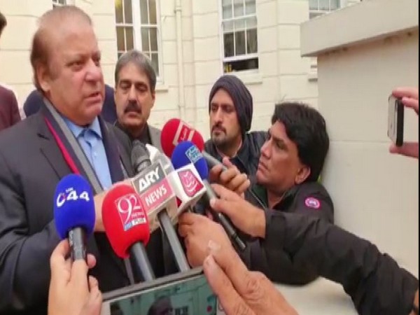 Former Pakistan Prmime Minister Nawaz Sharif speaking to reporters in London