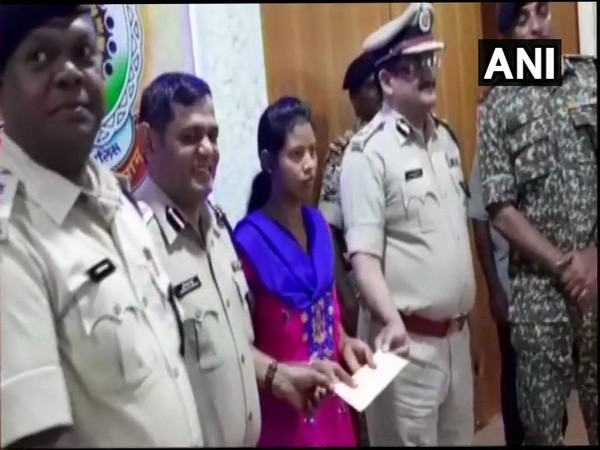 Visual of the woman surrendering before the police on Saturday in Rajnandgaon