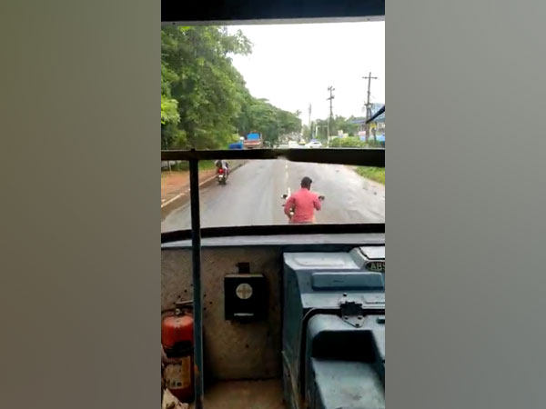 The bike rider blocking the way of KSRTC bus. 