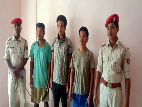 Three NDFB (S) cadres with Assam Police on Wednesday in Kokrajhar. Photo/ANI
