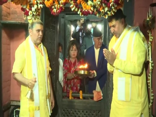 Nepal Prime Minister Sher Bahadur Deuba with his wife Arzu Deuba offering prayers in Samrajeswar Pashupatinath temple