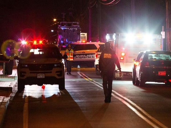 Police at the area where five people were stabbed in New York's Rockland County on Sunday.
