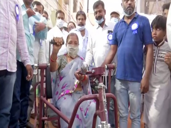 Hyderabad-based NGO distributing tricycles and wheelchairs to differently-abled people. (Photo/ANI)