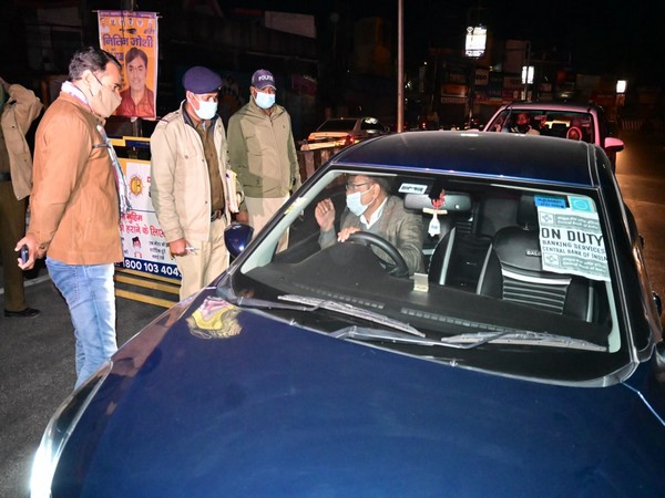 Delhi police questioning people amid night curfew on Monday. (ANI/pictures)