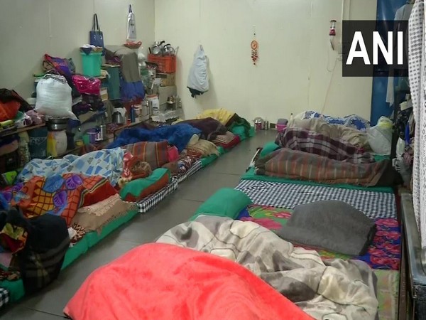 Homeless people took refuge at a night shelter in Lodhi Road. Photo/ANI