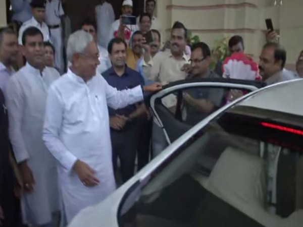 Bihar Chief Minister Nitish Kumar on Thursday arrived at the state assembly in an electric car. Photo/ANI