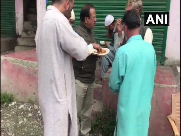 National Security Advisor Ajit Doval interacts with locals in Shopian and has lunch with them