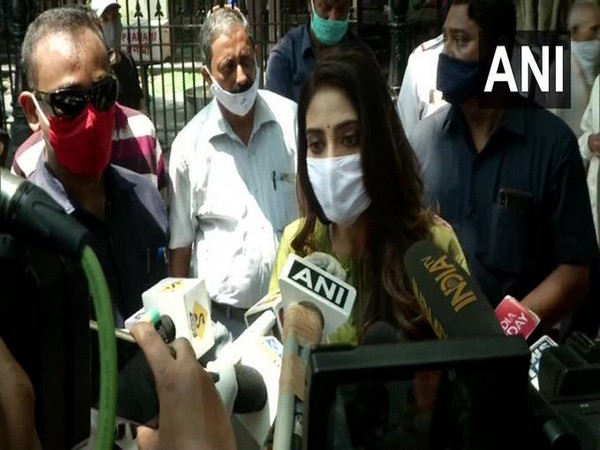 TMC MP Nusrat Jahan speaking to reporters in Kolkata on Wednesday.
