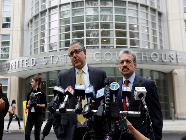 Keith Raniere's attorney Marc Agnifilo speaks to reporters outside the Brooklyn court on Wednesday (Photo/Reuters)