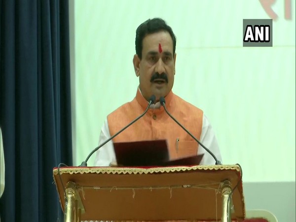 Narottam Mishra taking oath as minister in Bhopal on Tuesday.