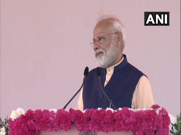 Prime Minister Narendra Modi addressing people near Statue of Unity in Gujarat on Thursday.