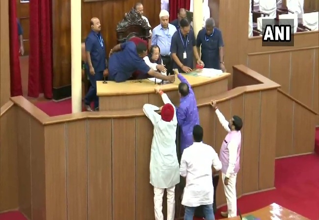 Congress MLAs staging protest in the well of the House at Odisha assembly in Bhubaneswar on Thursday.