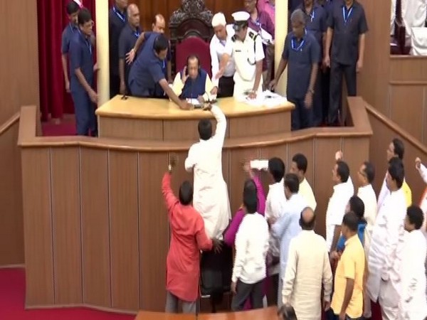 BJP and Congress MLAs protesting in the Assembly over poor law and order situation in Odisha. Photo/ANI