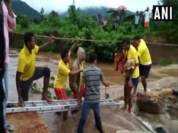 Visuals of people being rescued in Odisha.
