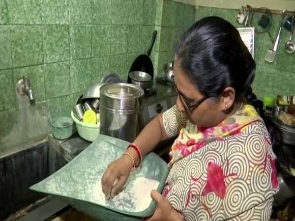 A beneficiary of the 'fine rice' scheme in Telangana (Photo/ANI)