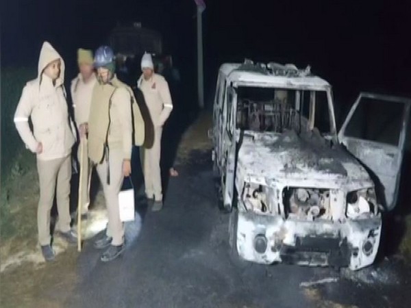 Visuals from the site where locals torched a police vehicle (Photo/ANI)