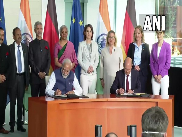 Prime Minister Narendra Modi and German Chancellor Olaf Scholz sign the green & sustainable energy partnership in Berlin.