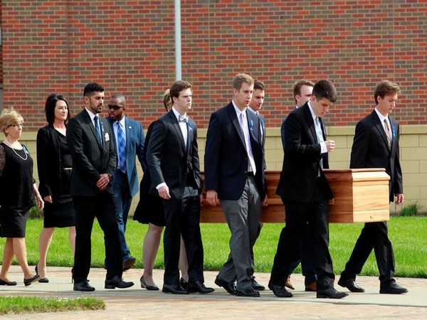 The casket of Otto Warmbier being carried to the hearse in Ohio, US in 2017 (Photo/Reuters)
