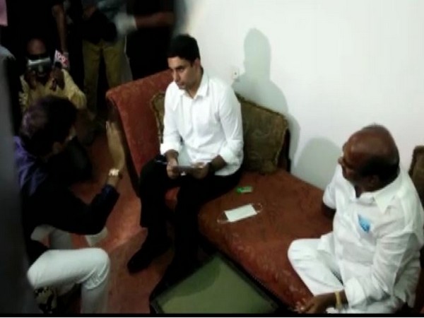 TDP general secretary Nara Lokesh interacting with family members of JC Prabhakar Reddy in Anantapuram on Monday. (Photo/ANI)