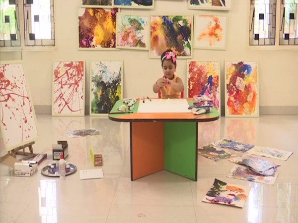 Visual of Anvi Vishesh Agrawal with her paintings (Photo/ANI)
