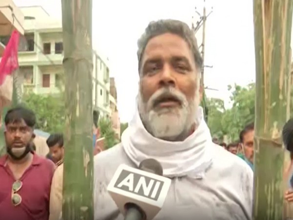 Jan Adhikar Party (L) Chief Pappu Yadav at the torch march in Patna.