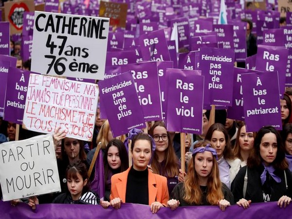 The city was awash in a sea of purple placards and flags carried by the marchers to honour 130 women who activists say have been killed in France this year by a current or former partner.