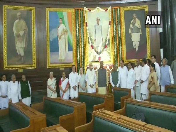 Congress, BJP leaders paying tribute to former prime minister Rajiv Gandhi in the Parliamnet on Tuesday. Photo/ANI