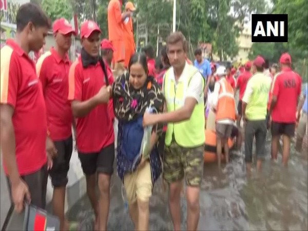 Patients being rescued by NDRF and SSB in Rajendra Nagaer on Thursday. (Photo/ANI)